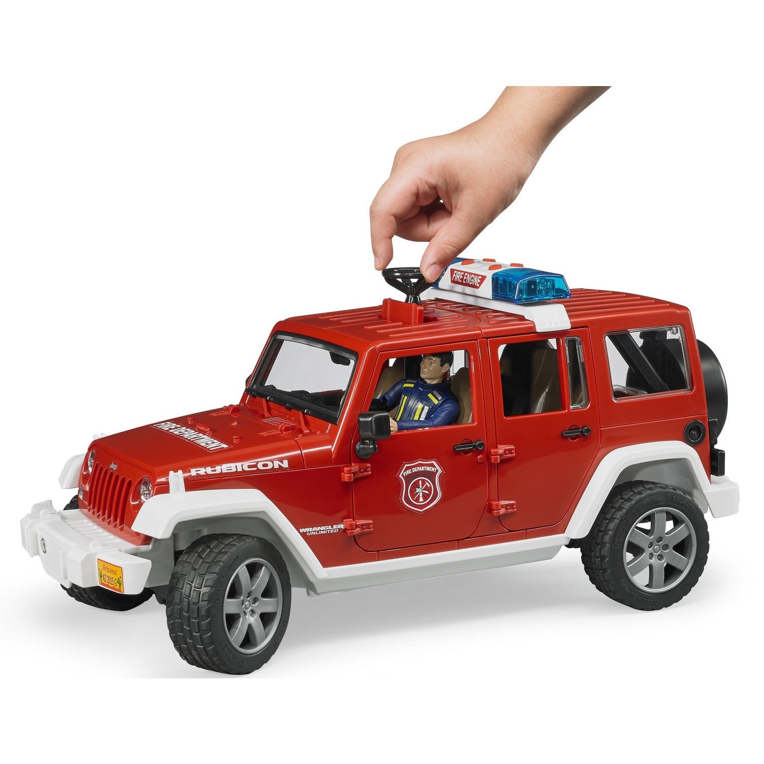 Masinuta de Pompieri Bruder 1:16 Jeep Wrangler Unlimited Rubicon cu Figurina, BR02528