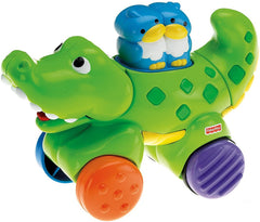 FISHER PRICE JUCARIE BEBE CROCODIL PRESS AND GO