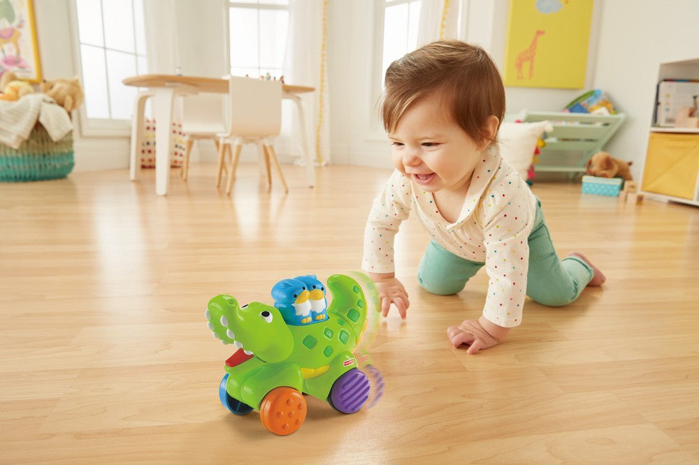 FISHER PRICE JUCARIE BEBE CROCODIL PRESS AND GO